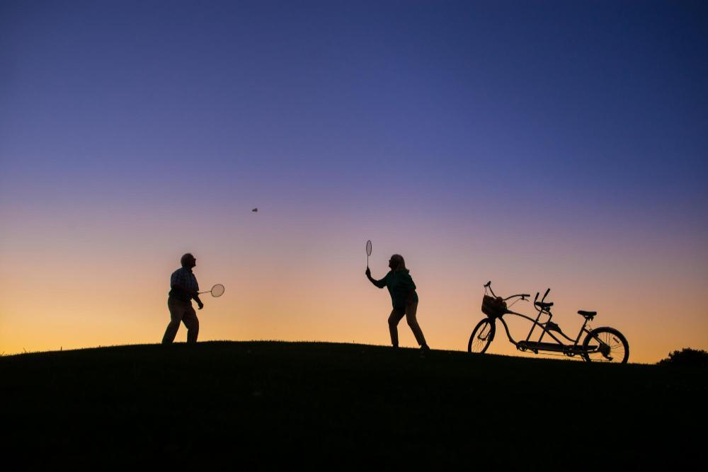 Badminton at sunset — weekend explorer